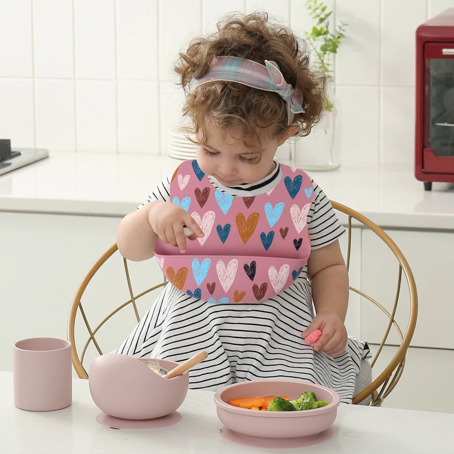 Modelbaby mit Herz Lätzchen